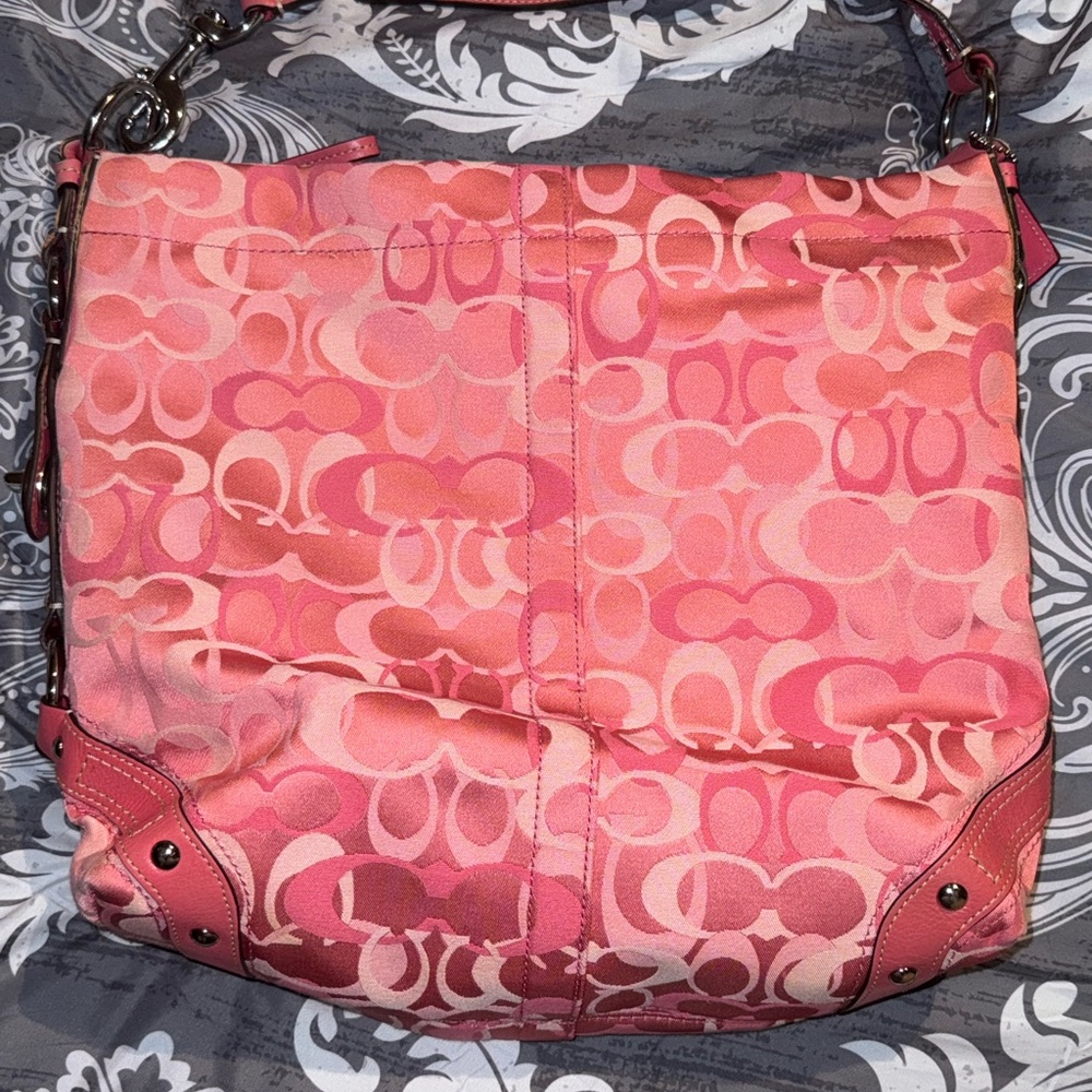 Coach Pink Shoulder Bag with Monogram Pattern and Slouchy Shape